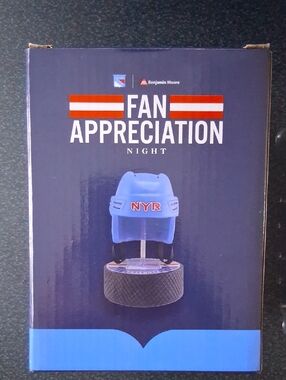 New York Rangers Fan Appreciation night. Centennial helmet puck stand